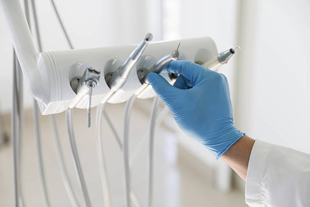 Professional Invisalign Clear Aligners technician working in Mandeville, LA
